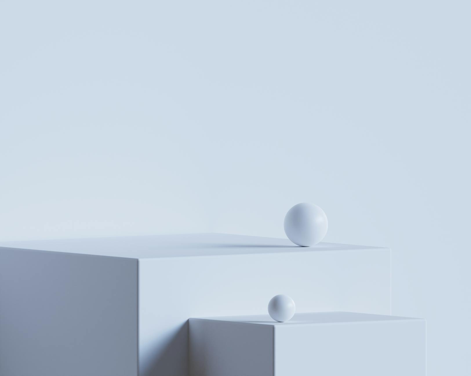 Elegant minimalist scene with white geometric shapes on a light blue backdrop.