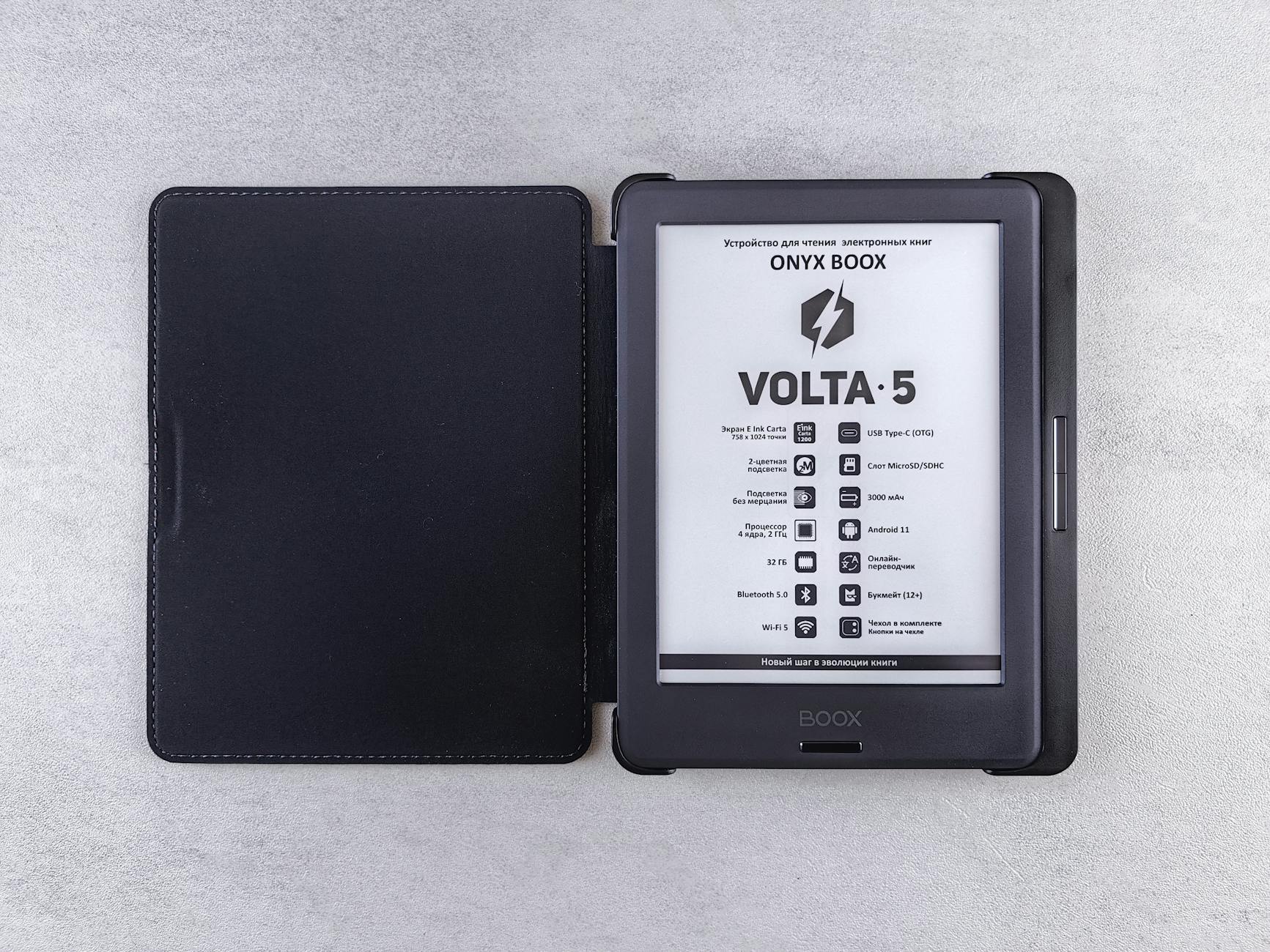 Top view of an Onyx Boox Volta 5 ebook reader in an open black leather case.